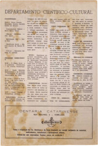 Fotografia de página única de boletim vista de frente, com título “Departamento Científico-Cultural” no topo e manchas de envelhecimento visíveis no papel. O texto está organizado em colunas e, ao final, há um anúncio publicitário da loja Dentária Catarinense em destaque.
