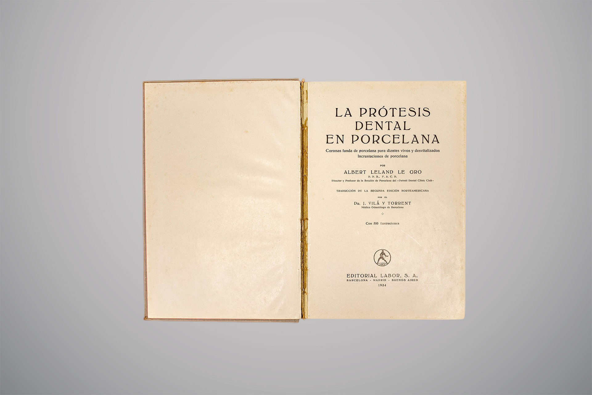 Página de rosto de um livro antigo em espanhol, com o título centralizado “La prótesis dental en porcelana”, de Albert Leland Le Gro, traduzido por J. Vilá y Torrent; abaixo, o nome da editora “Editorial Labor, S. A.” e o ano “mil novecentos e trinta e quatro”.